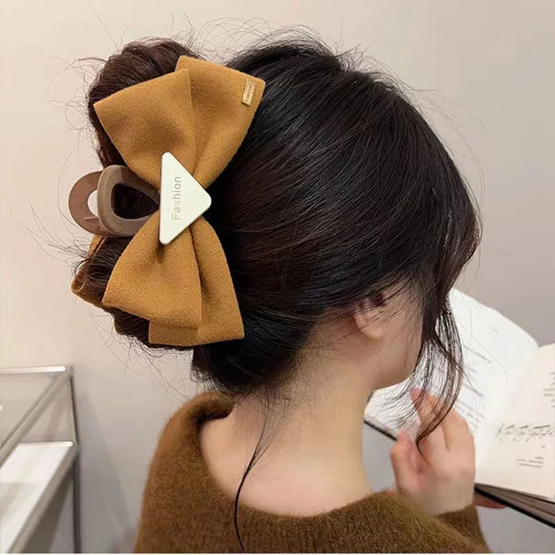 Wholesale Retro Bow High Skull Hair Clip