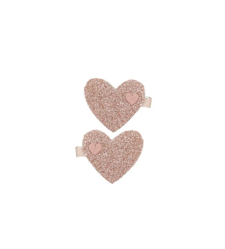 Pink heart-shaped hair clips