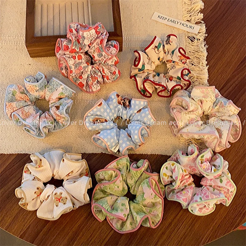 Wholesale of Colored Bear Floral Fabrics Hair Scrunchies